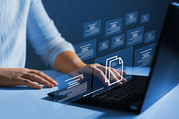 laptop with digital file icons